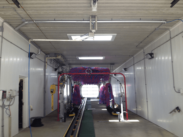 Car wash paneling in car wash bay