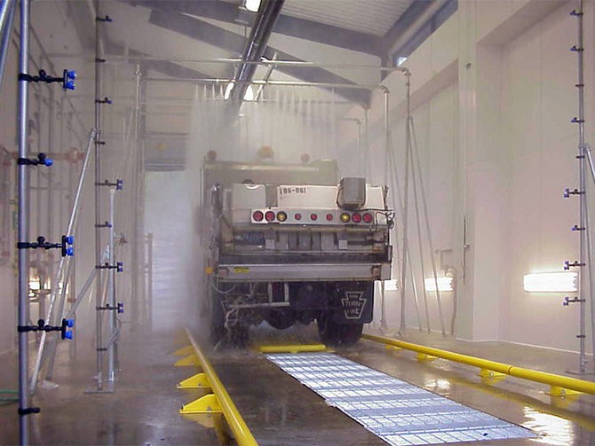 Salt truck in an industrial wash tunnel