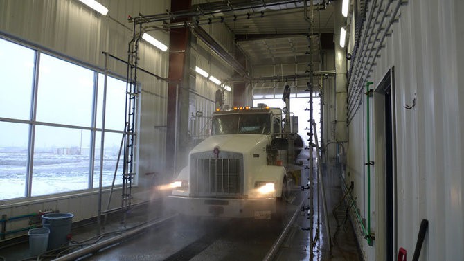 Truck wash in industrial wash tunnel